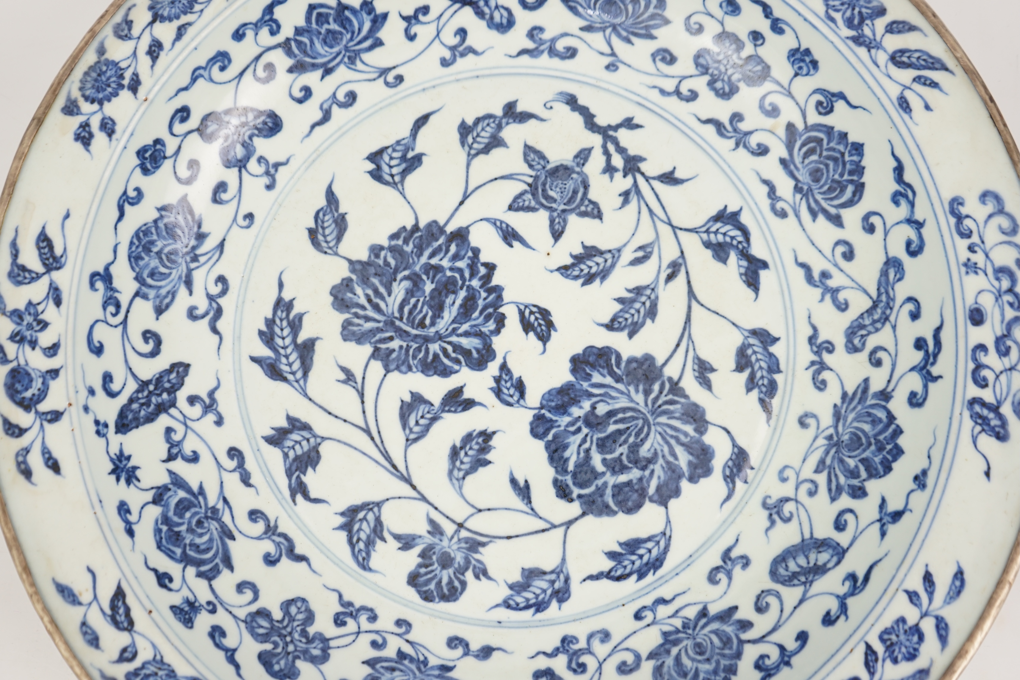 A large Chinese Ming style blue and white dish, possibly 18th century